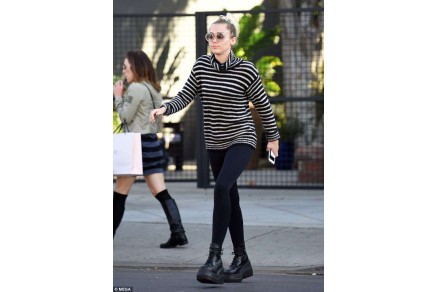 miley cyrus wearing demonia shaker-52 ankle boots